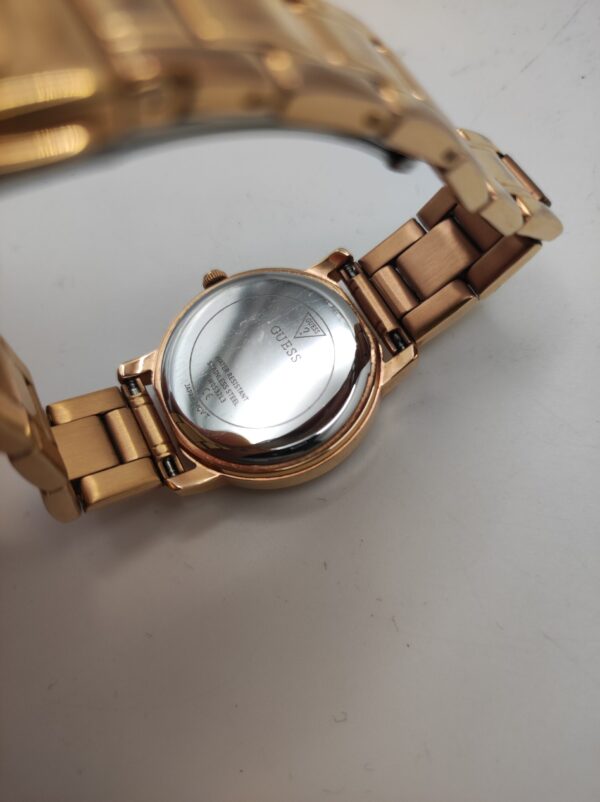 IMG 20240214 105343 XhbMkD scaled 1 RELOJ SEÑORA GUESS GW0532L3 COLOR BRONCE ESFERA MORADA