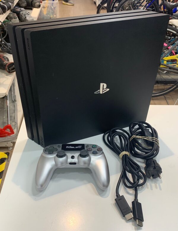 WhatsApp Image 2024 07 08 at 19.02.16 CONSOLA SONY PS4 PRO 1TB + MANDO COMPATIBLE COLOR GRIS.