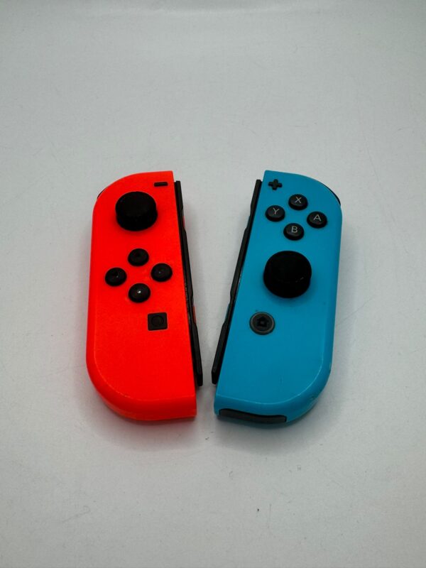 WhatsApp Image 2024 08 07 at 17.31.09 MANDO NINTENDO SWITCH JOYCON AZUL Y ROJO