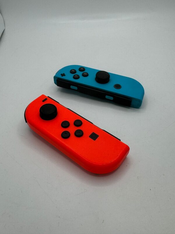 WhatsApp Image 2024 08 07 at 17.31.10 MANDO NINTENDO SWITCH JOYCON AZUL Y ROJO