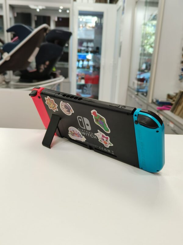 15u497119 2 CONSOLA NINTENDO SWITCH ROJA Y AZUL + CARGADOR + ACCESORIOS