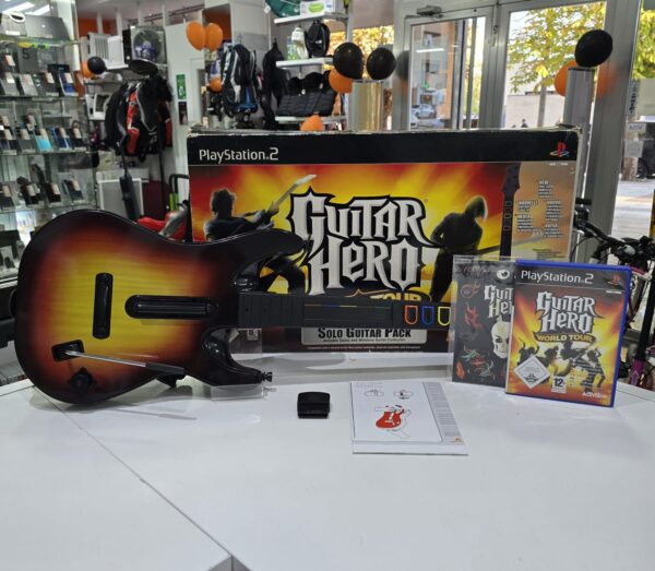 503286 7 VIDEOJUEGO PS2 GUITAR HERO WORLD TOUR + CAJA + GUITARRA + ACC