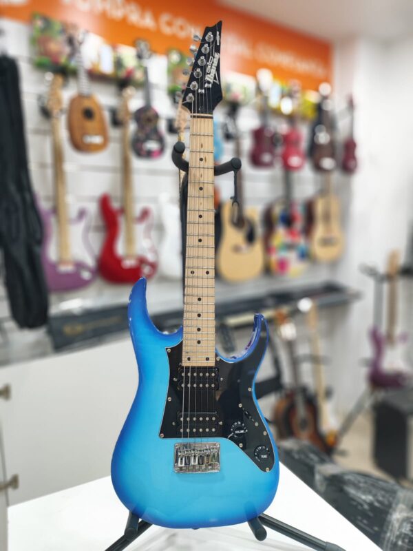 Imagen de WhatsApp 2024 10 01 a las 13.01.30 80692892 GUITARRA ELECTRICA GIO IBANEZ GRGM21M-BLT TAMAÑO 3/4 - CELESTE + FUNDA EK