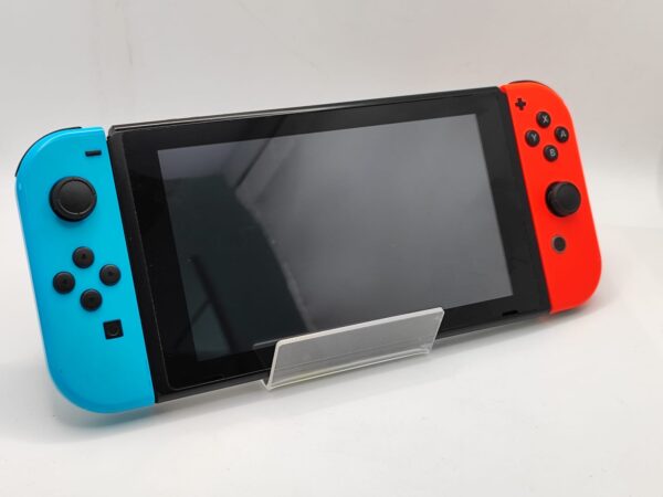 Imagen de WhatsApp 2024 10 31 a las 17.03.30 b2eaf13e CONSOLA NINTENDO SWITCH JOYCON AZUL Y ROJO + BASE DE CARGA BLANCA * DETALLE SEGUROS ROTOS*