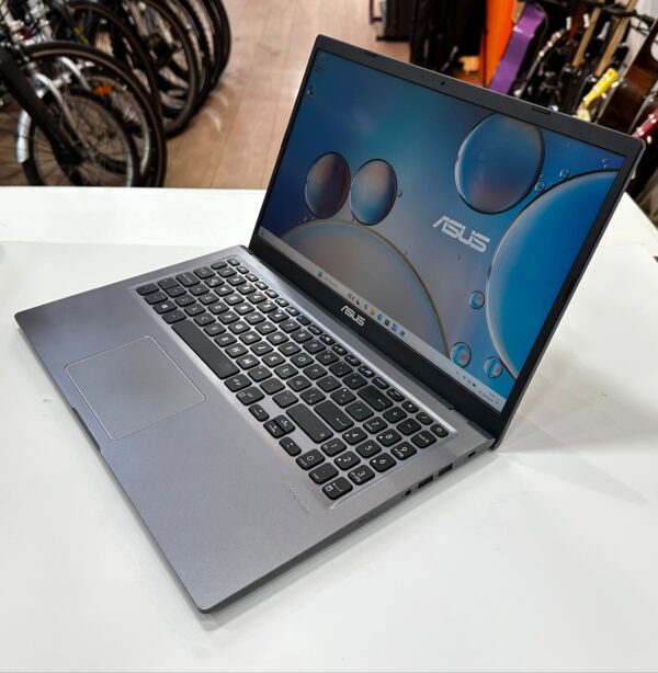 WhatsApp Image 2024 10 16 at 20.24.46 PORTATIL ASUS X515EA CORE I3-1115G4 24GB 256GB SSD + CARGADOR