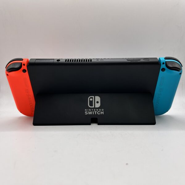 505757 3 scaled CONSOLA NINTENDO SWITCH OLED NEON/AZUL CON CARGADOR Y FUNDA