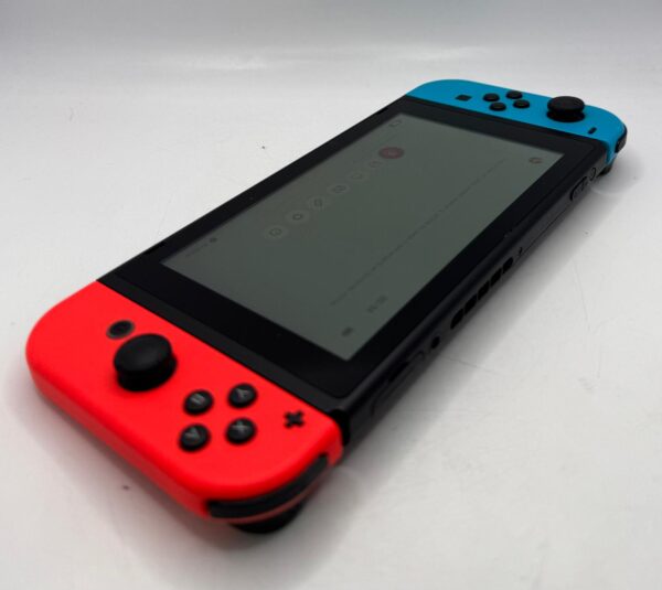 507498 2 CONOSOLA NINTENDO SWITCH + CARGADOR + ACC + CAJA