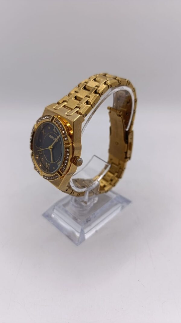 509281 2 RELOJ SKYLINE DORADO S018