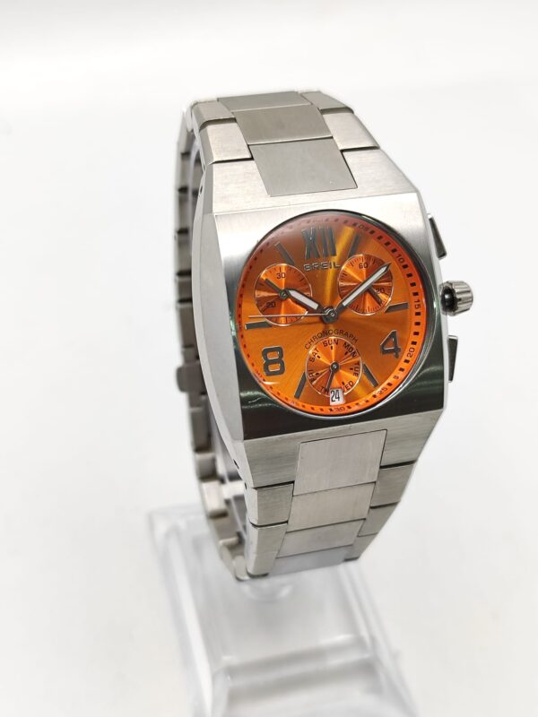 Imagen de WhatsApp 2024 11 05 a las 19.59.01 b402c077 RELOJ SEÑORA BREIL CRONOGRAFO ESFERA NARANJA CORREA METAL