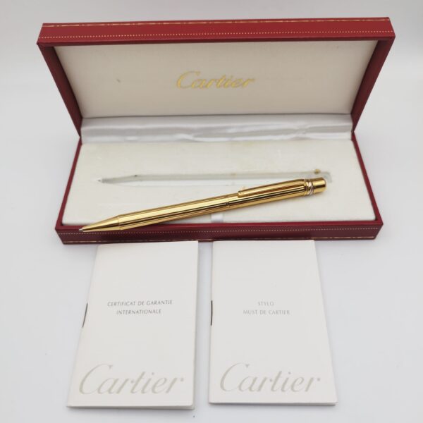 513550 1 BOLIGRAFO CARTIER TIRINITY GOLD PLATED AÑO 2002 + ESTUCHE + PAPELES