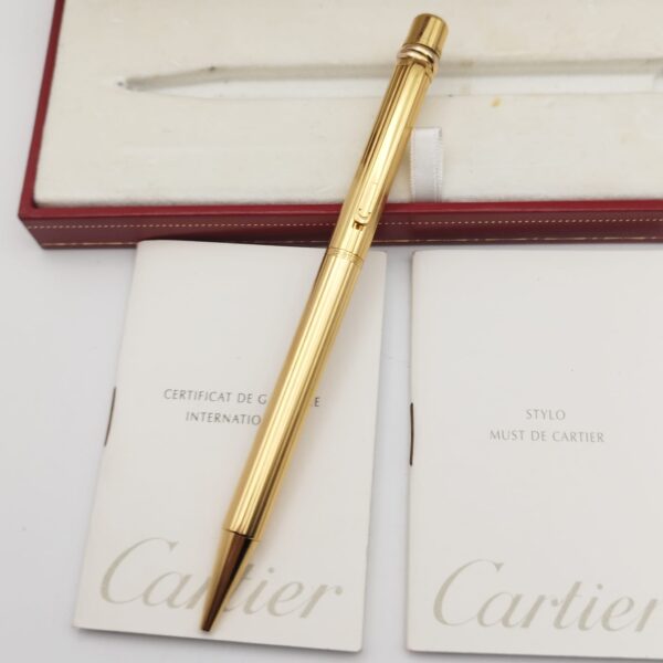 513550 6 BOLIGRAFO CARTIER TIRINITY GOLD PLATED AÑO 2002 + ESTUCHE + PAPELES