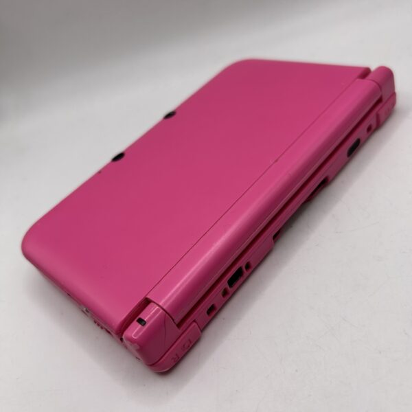 518406 3 scaled CONSOLA NINTENDO 3DS XL ROSA + CARGADOR