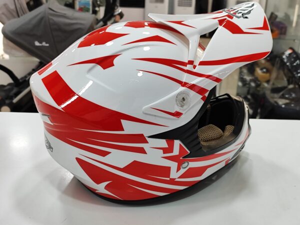 Imagen de WhatsApp 2025 01 11 a las 11.30.18 6c51be88 CASCO MOTO NVG MX-306 NIÑO TALLA YM 51-52 BLANCO Y ROJO