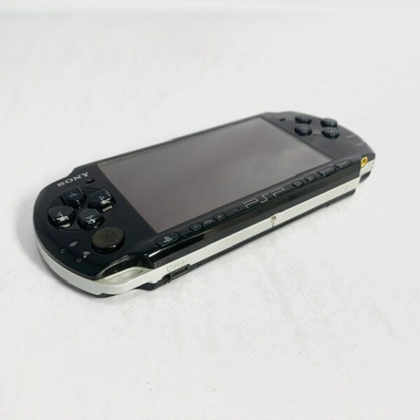 533927 5 CONSOLA PSP + CARGADOR