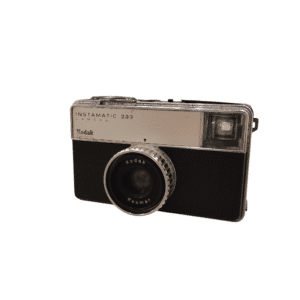 CAMARA ANALOGICA KODAK INSTAMATIC 233 + FUNDA (DECORATIVA)