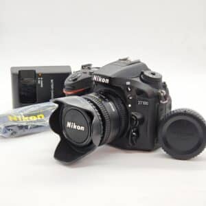 CAMARA REFLEX NIKON D7100 + OBJETIVO 50MM 1:1:8 D + CARGADOR