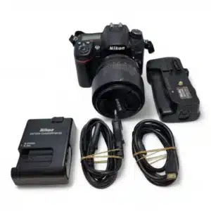 CAMARA DE FOTOS NIKON D7000 + OBJETIVO 18-105MM 1:3-5.6G ED + CARGADOR + FUNDA