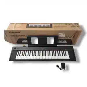 TECLADO YAMAHA PIAGGERO NP-12 + CARGADOR + CAJA